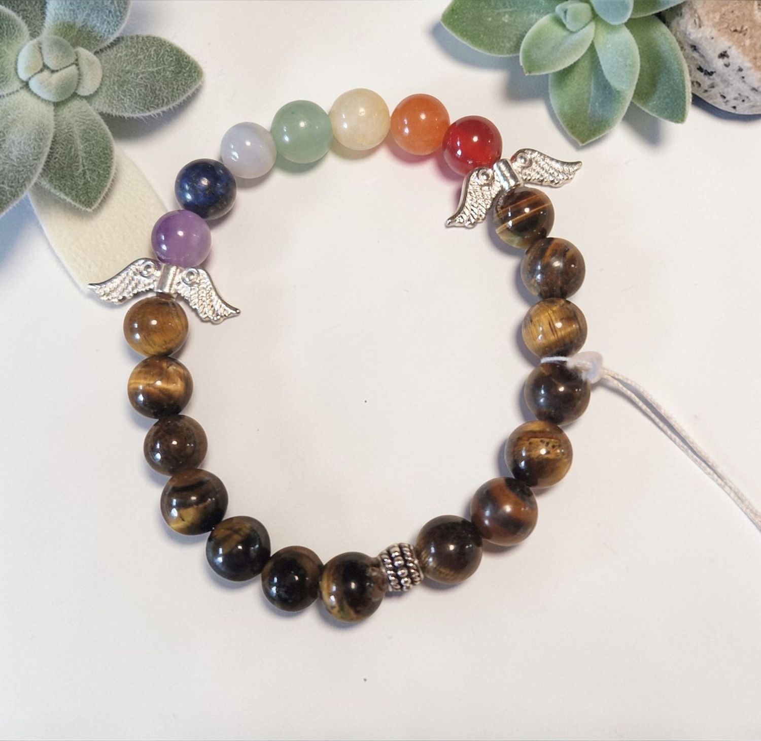 Chakra ​Armband -Tigerauge in A Qualität -  silberfarbene Engelflügel - 8 mm
