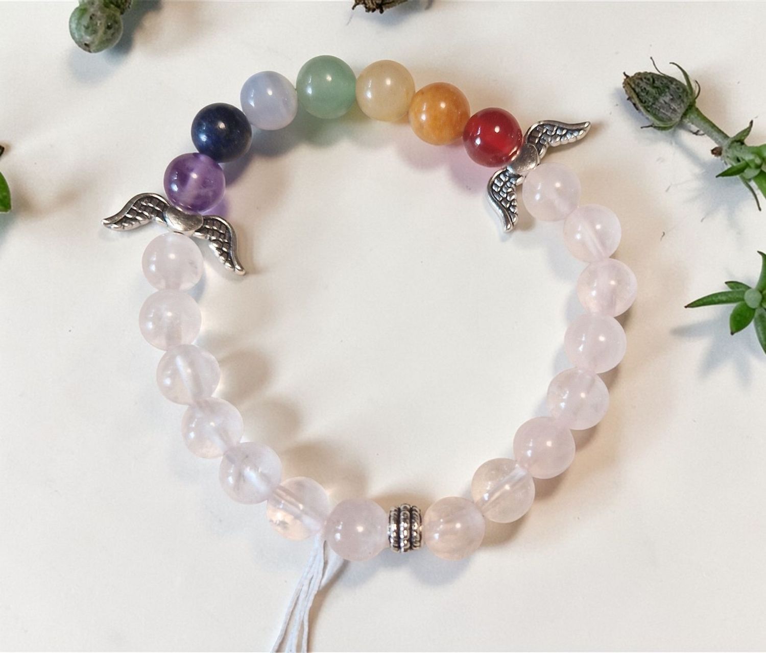 Chakra ​Armband - Rosenquarz in AA Qualität -  silberfarbene Engelflügel - 8 mm