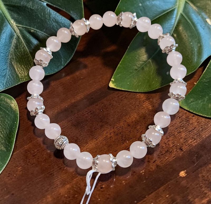 Armband - Rosenquarz - AB Qualität - 6 mm - silberfarbene Blüten