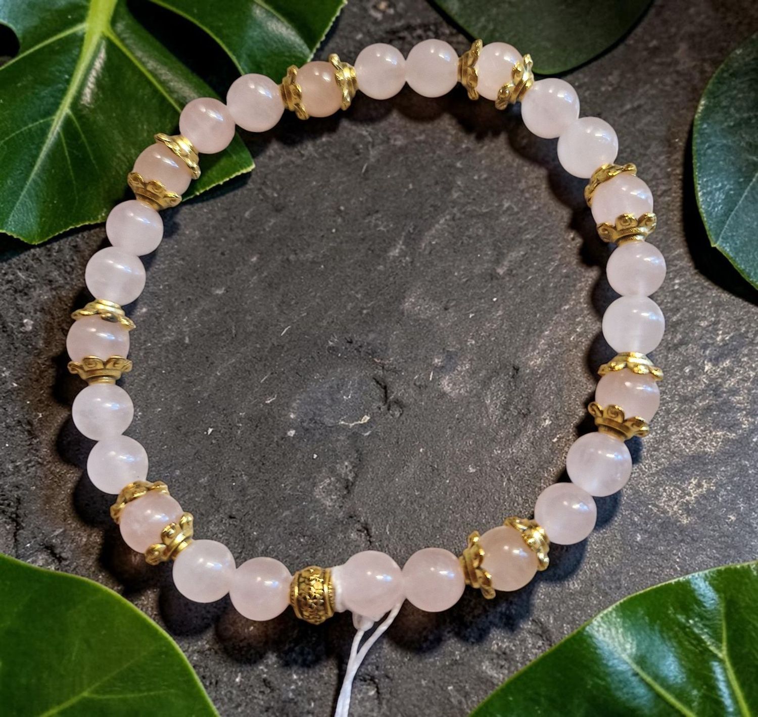 ​Armband - Rosenquarz - AB Qualität - 6 mm - goldfarbene Blüten