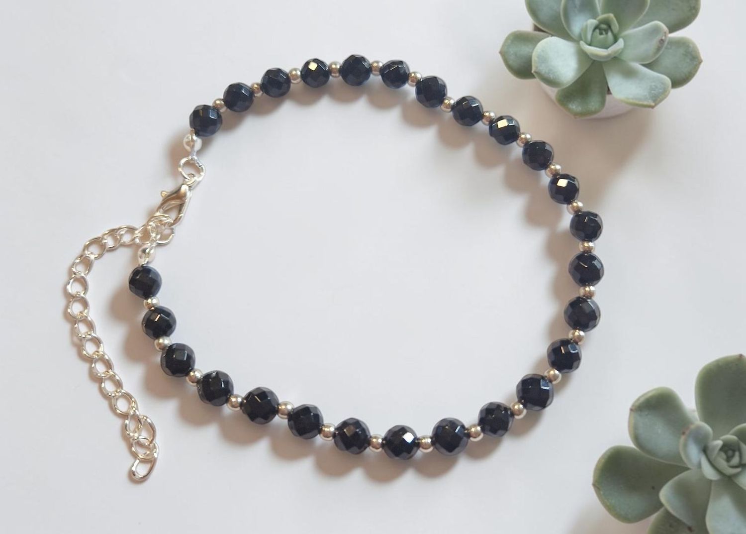 Fußkettchen - Onyx facetiert 6mm AB Qualität Fußkettchen - Onyx facetiert 6mm AB Qualität