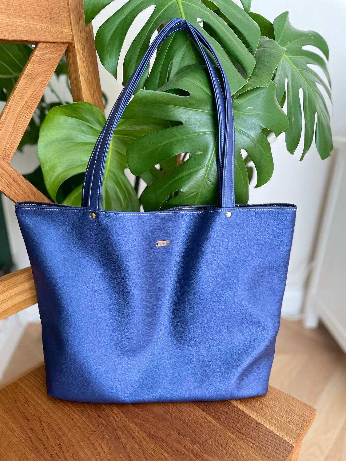 Classic Blue Faux Leather Tote Bag with Patterned Lining