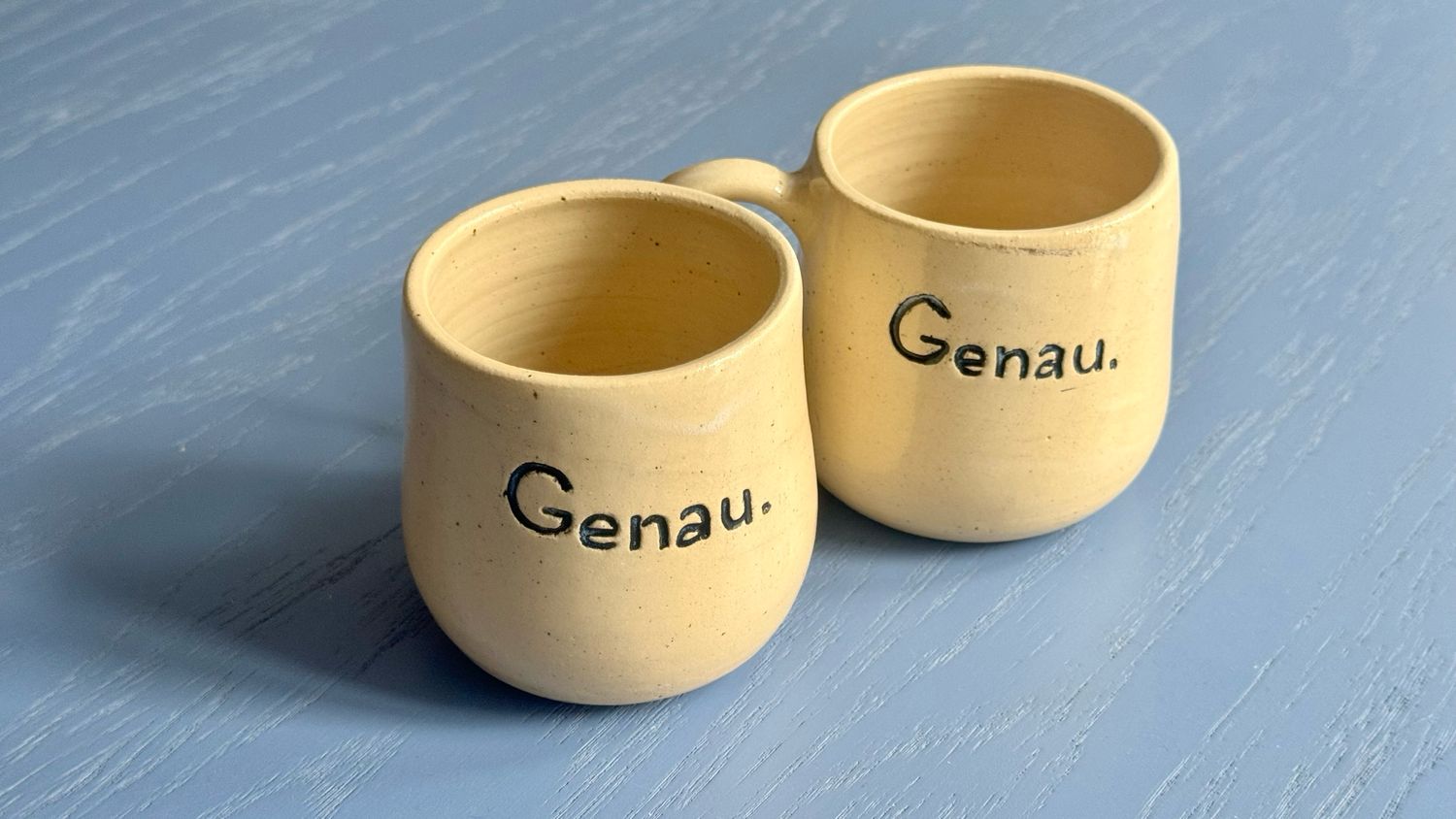 Phrasal Cups - "Genau"