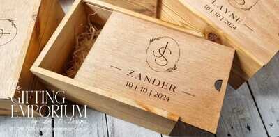 Wooden handmade gift box with custom engraving on lid, dimensions 23cm x 16cm x 11cm."