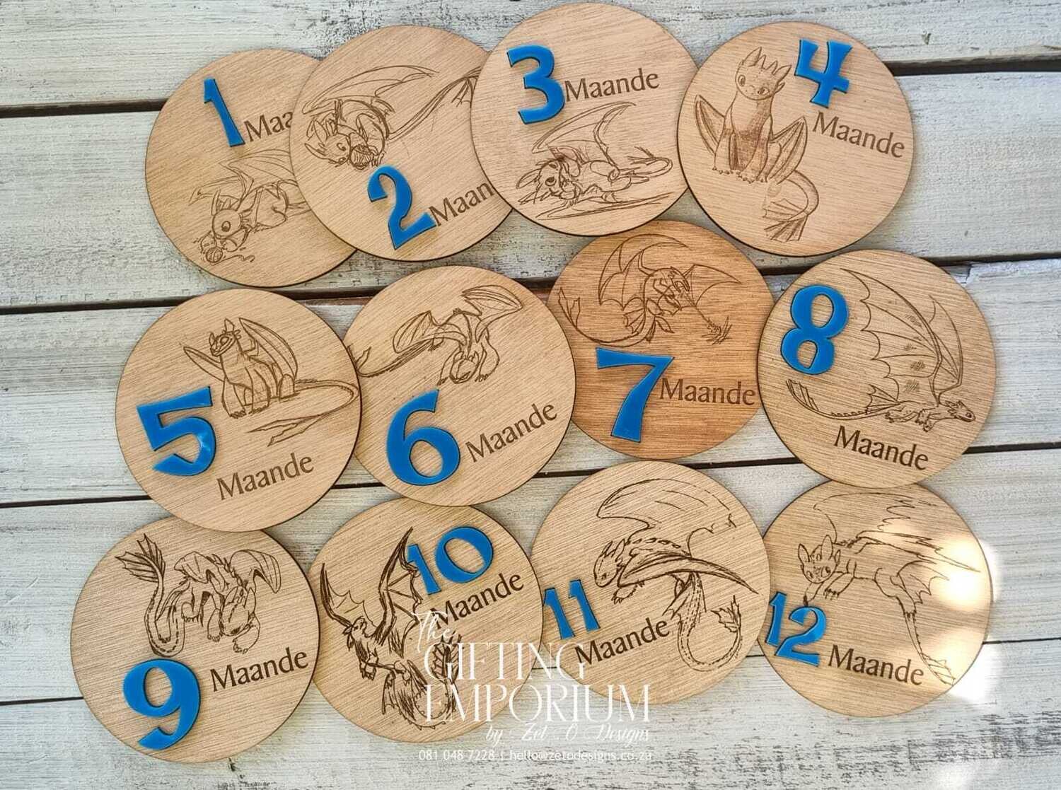 "Personalized milestone board with custom motif engraving on wood and acrylic."
