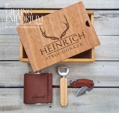 Premium Gentleman's Reserve Gift Box, featuring custom engraving on a wooden box, hip flask, bottle opener, and pocket knife