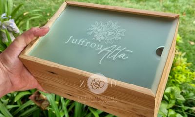 Elegant arrangement of flowers in a beautifully crafted gift box