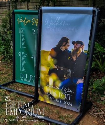Elegant custom-designed PVC wedding banner with floral accents and personalized couple names."