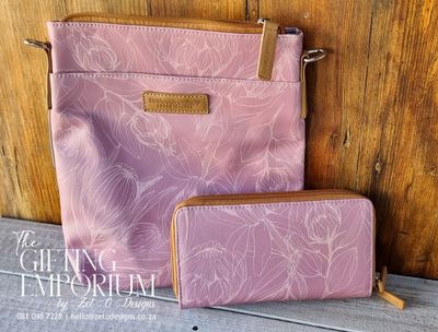 "Elegant pink protea-themed handbag set featuring matching accessories."
