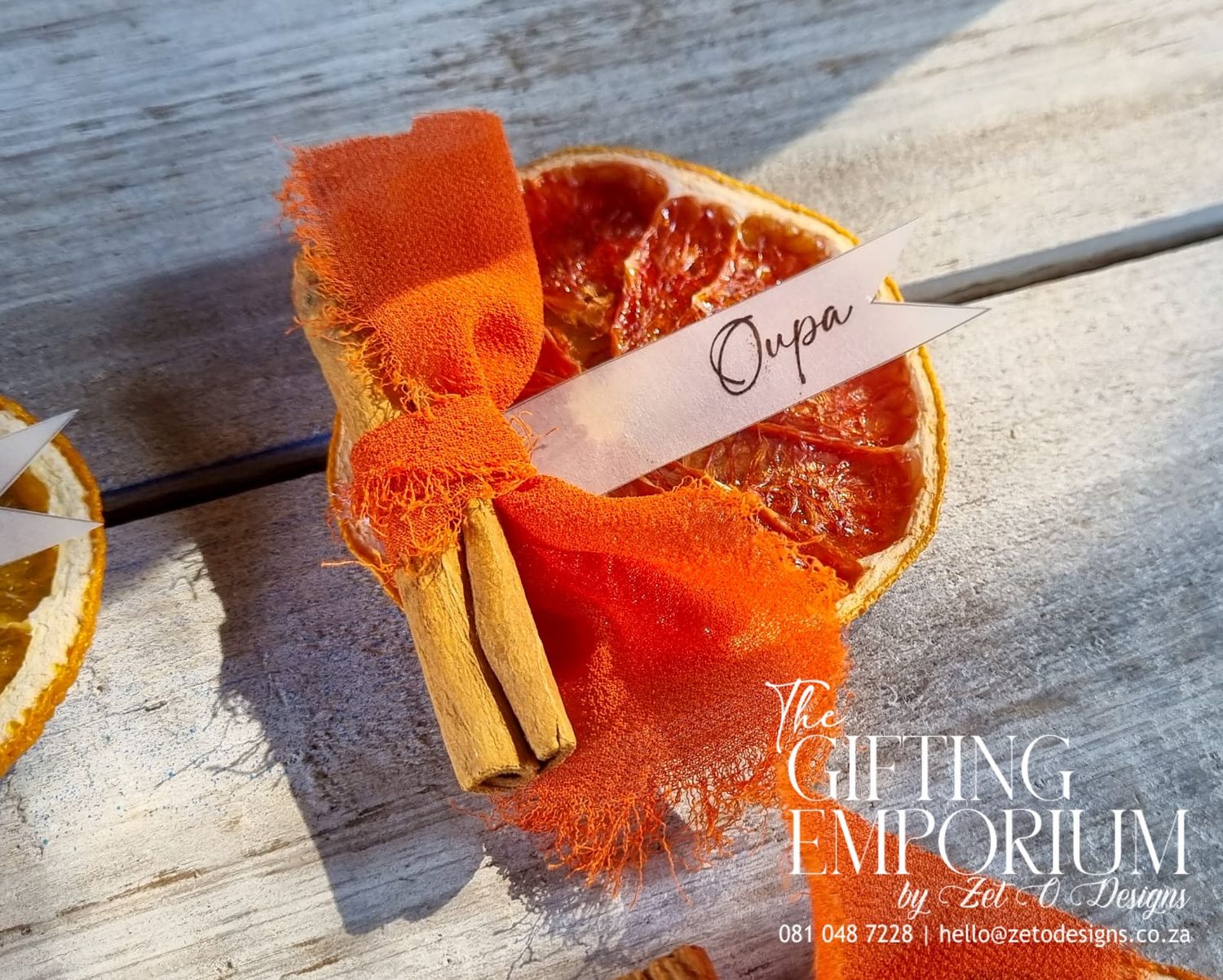 Elegant dried citrus name placements, perfect for weddings or formal events.