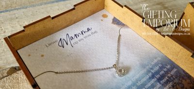 Elegant silver necklace with heart-shaped pendant, perfect gift for mother or mother-in-law.
