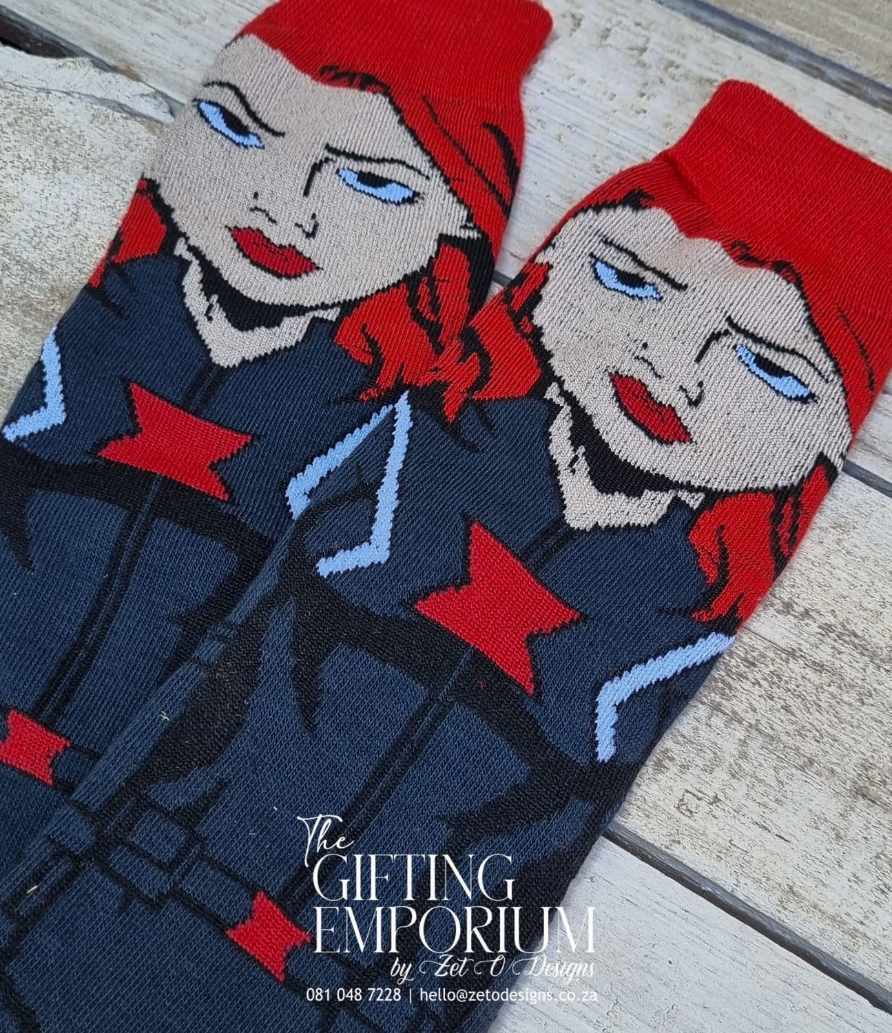 "Black Widow-themed sock set featuring black and red designs."
