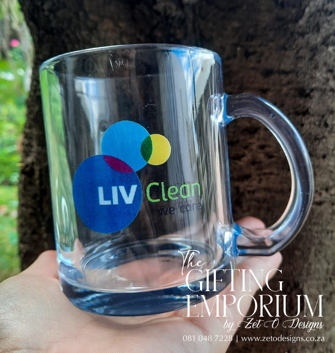 Elegant clear glass mug featuring laser-engraved custom logo, perfect for professional corporate gifts and employee recogniti
