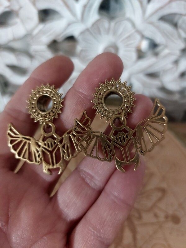 Brass scarab tunnels