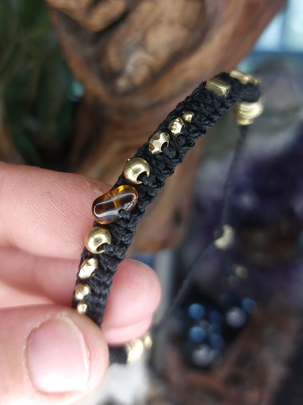 Golden amber charm