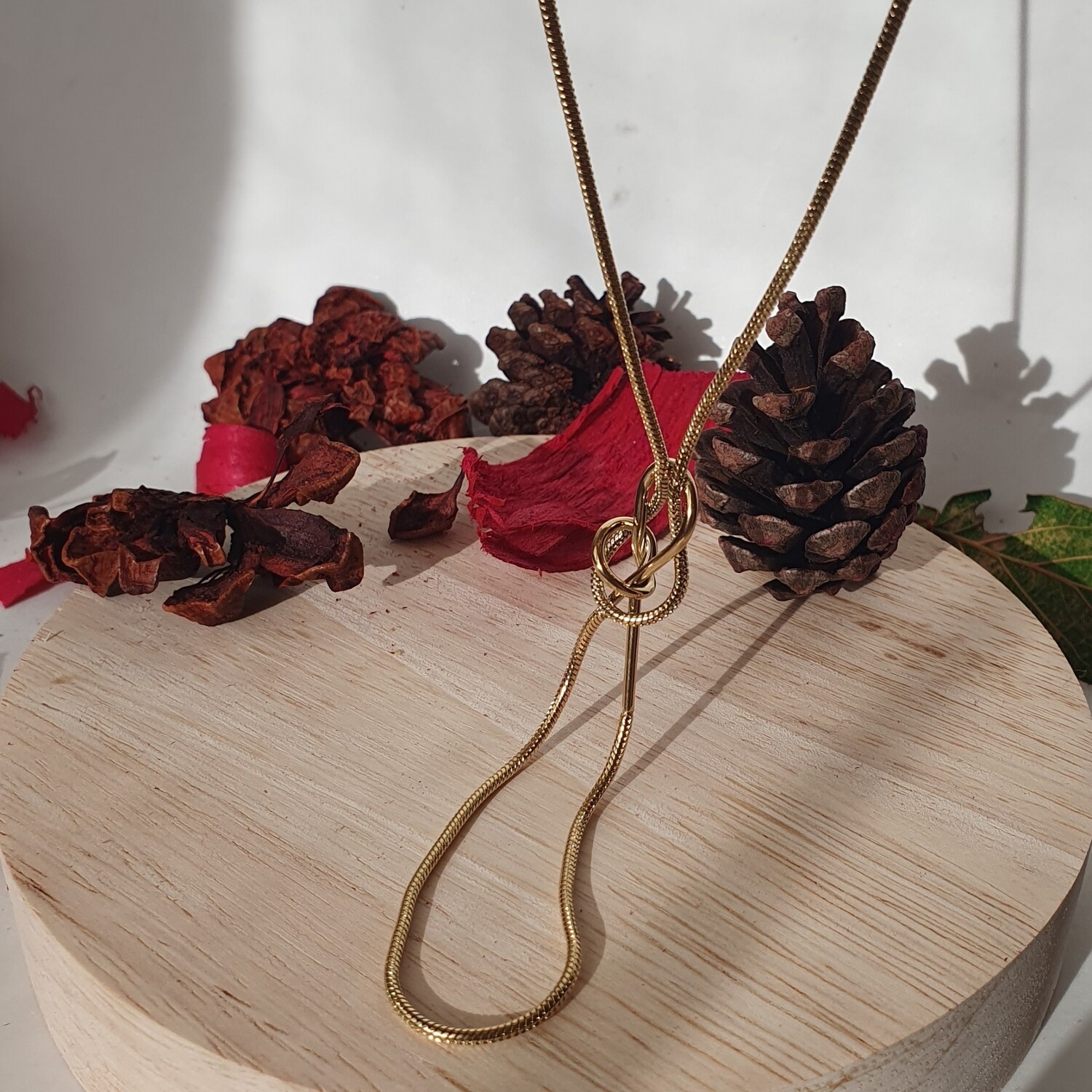 Collier noeud doré 