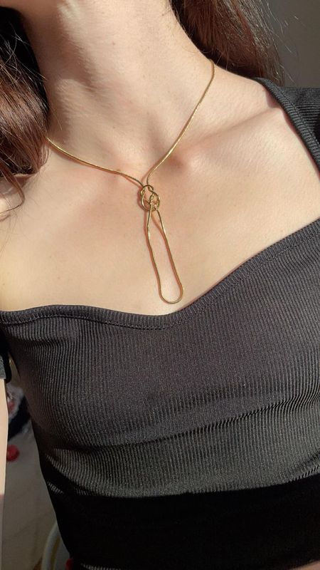 Collier noeud doré 