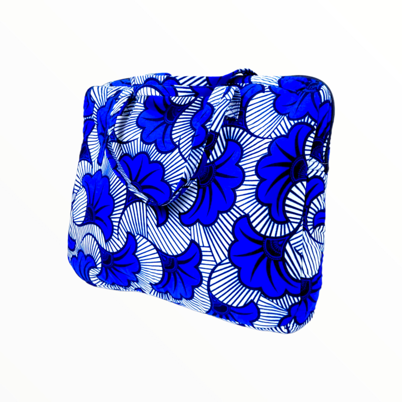 A vibrant laptop bag featuring a blue floral pattern with white accents, set against a light background. The design is bold and lively.