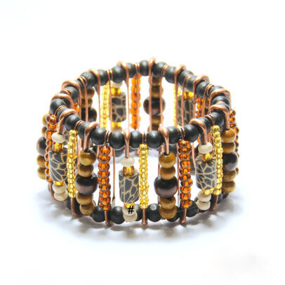 Wood, glass, animal print fimo on safety pins bracelet