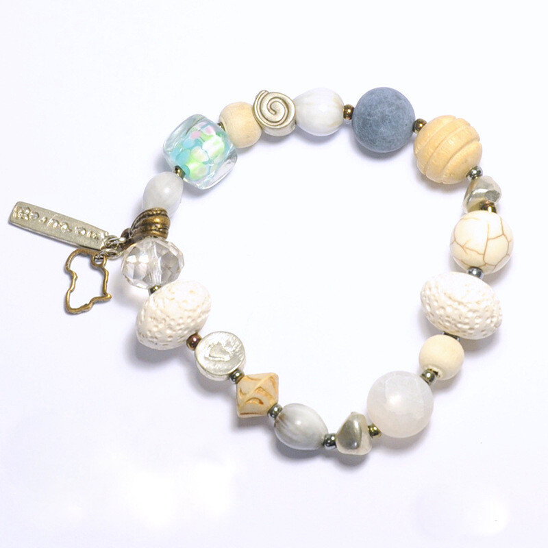 Collection of various gems with Africa and “nature” charms