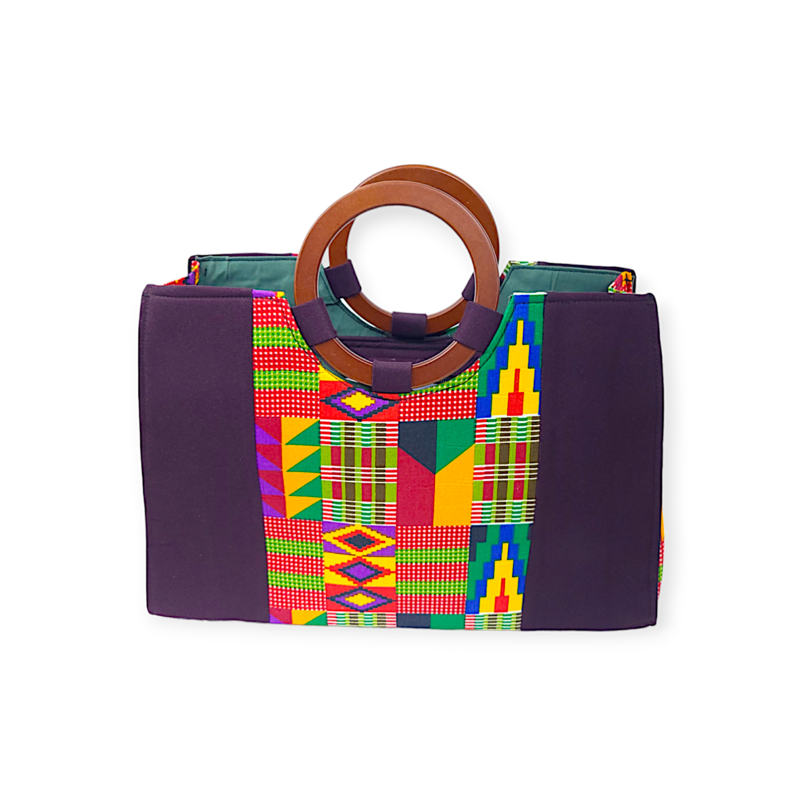 Purple tote bag with vibrant Kente patterns, featuring geometric shapes in red, yellow, green, and blue. Accented with wooden circle handles.