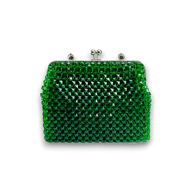 Elegant green beaded handbag with shimmering crystals and a silver clasp handle, set against a black background. The tone is luxurious and sophisticated.