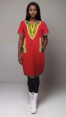 A stunning red daishiki shirt dress adorned with yellow and green accents, celebrating African fashion and heritage.
