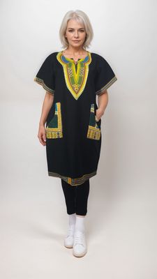 A striking black and yellow daishiki shirt dress crafted from traditional African fabric, featuring bold, colorful patterns.