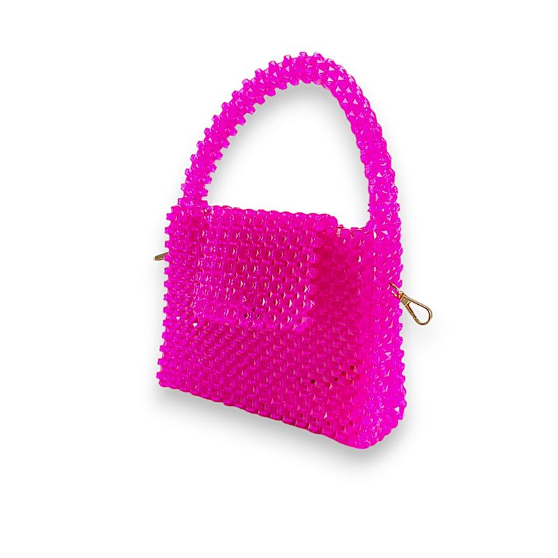 A handbag made of pink beads with a gold chain strap and a visible blue interior lining.