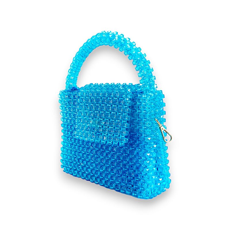 A handbag made of aquamarine beads with a gold chain strap and a visible blue interior lining.