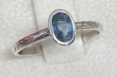 Modest Oval Ring with Detailed Band