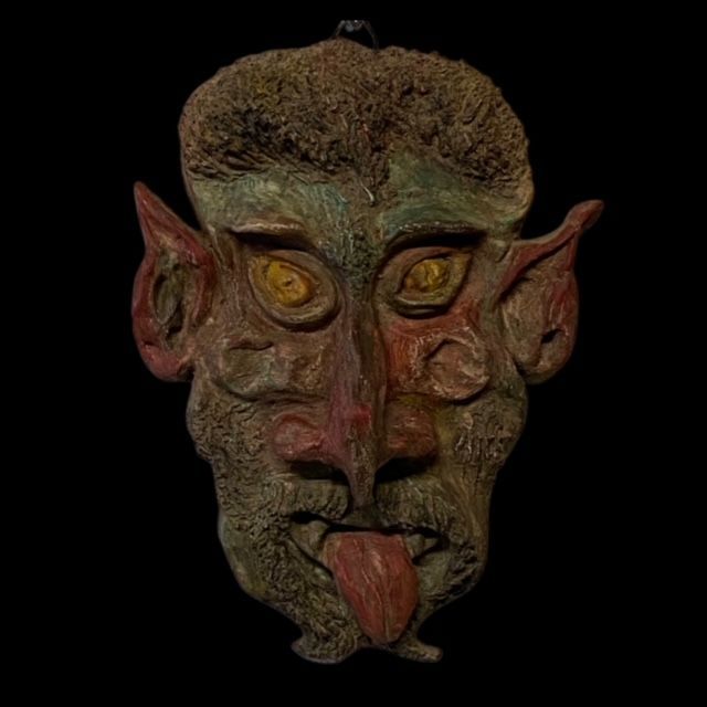 Polychrome terracotta demon mask, France late 19th century