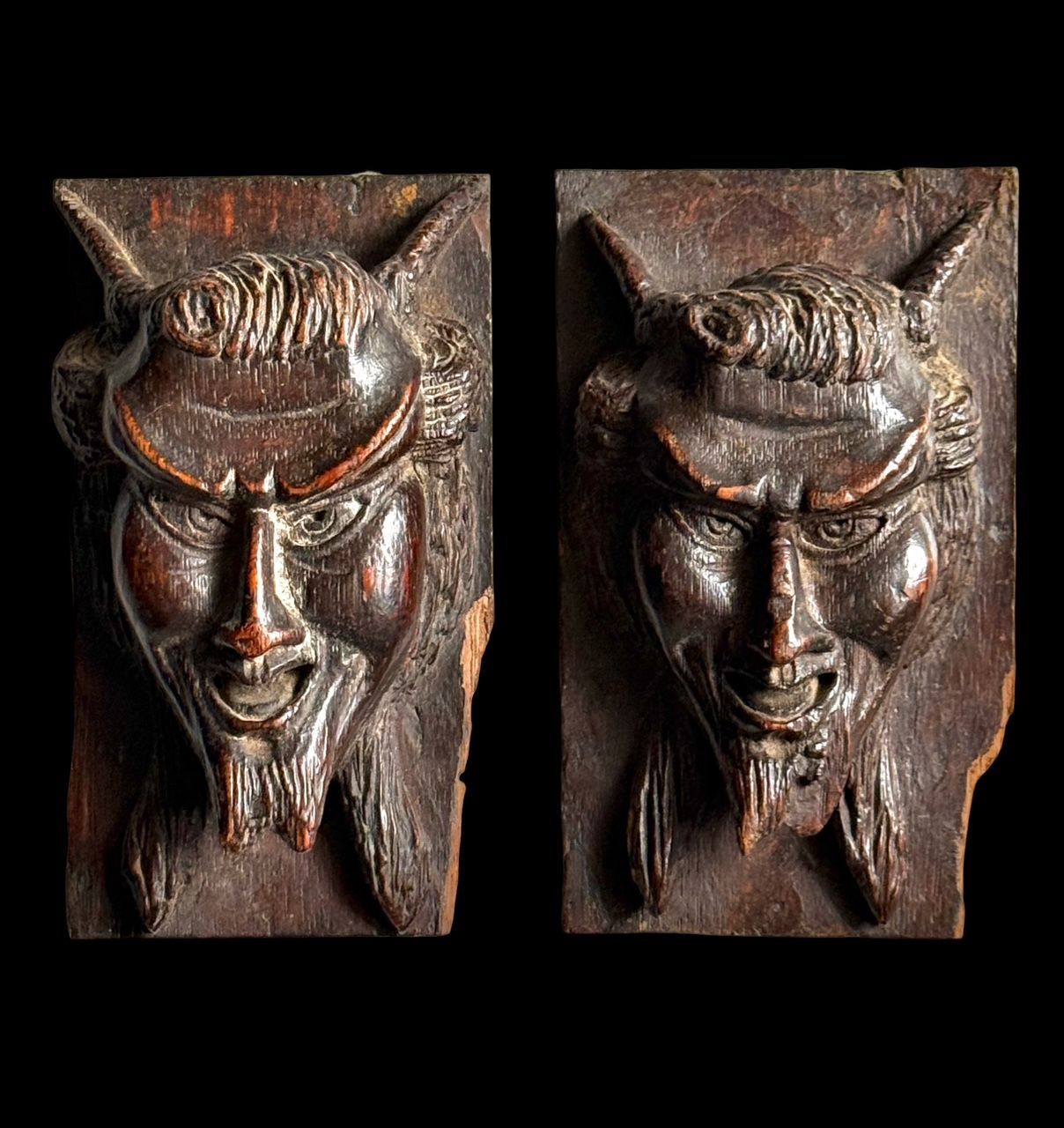 Rare pair of devil faces carved in wood, Italy 18th-19th century