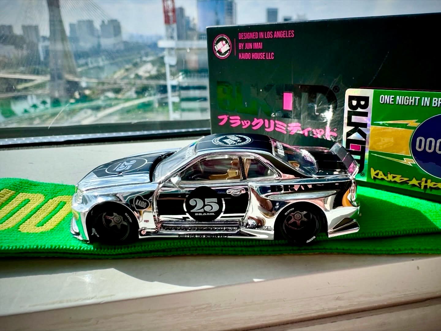 [PREORDER] KAIDOHOUSE BLK LTD Nissan Skyline GT-R (R34) Kaido Racing (KHMG205) | 2025 Salao Diecast Brazil