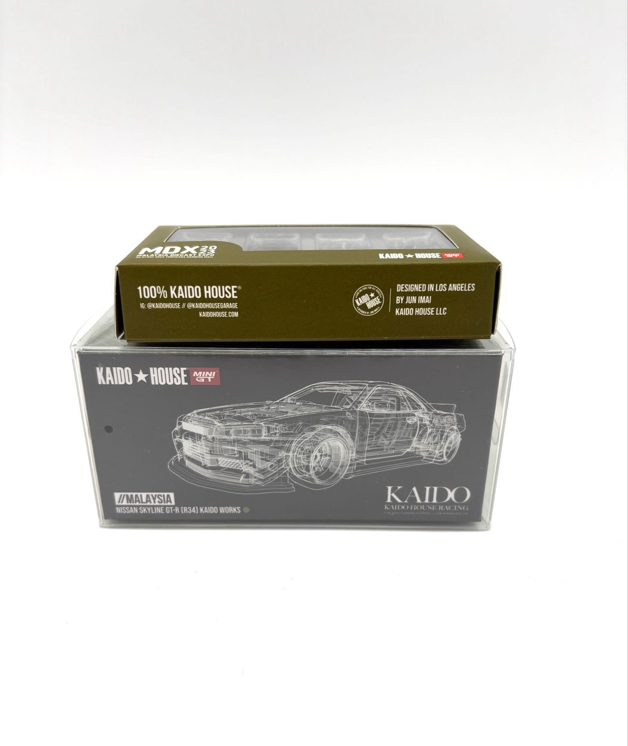 KAIDOHOUSE Nissan Skyline GT-R (R34) Kaido Works Millennium Jade (KHMG058) | 2023 MDX Malaysia Diecast Expo | with Exclusive Figurine