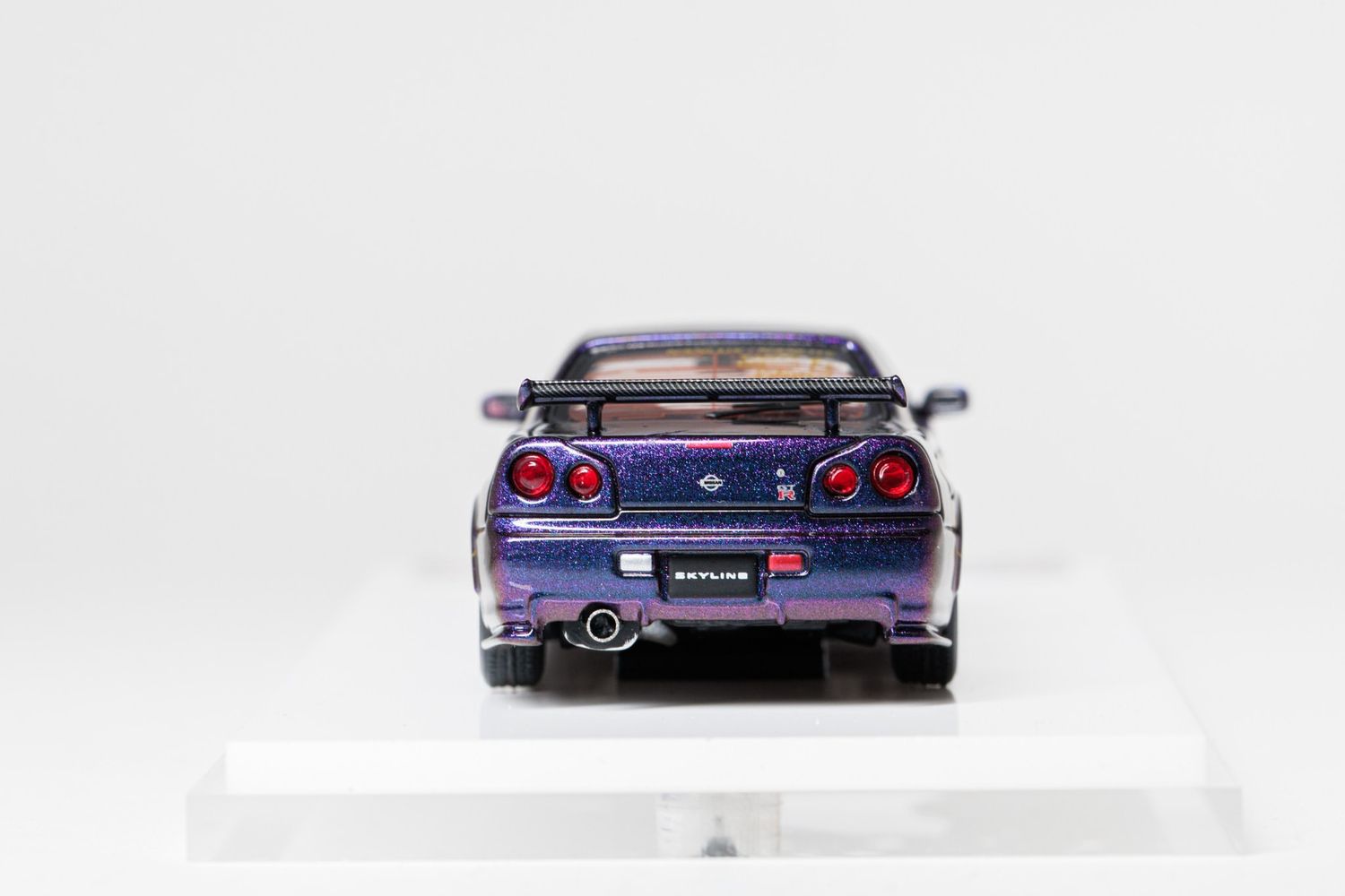 Nissan Skyline GT-R R34 TAS 2026 限定版ミニカー Motorhelix Nissan Skyline GT-R (R34) Customized TAS 2026 Purple