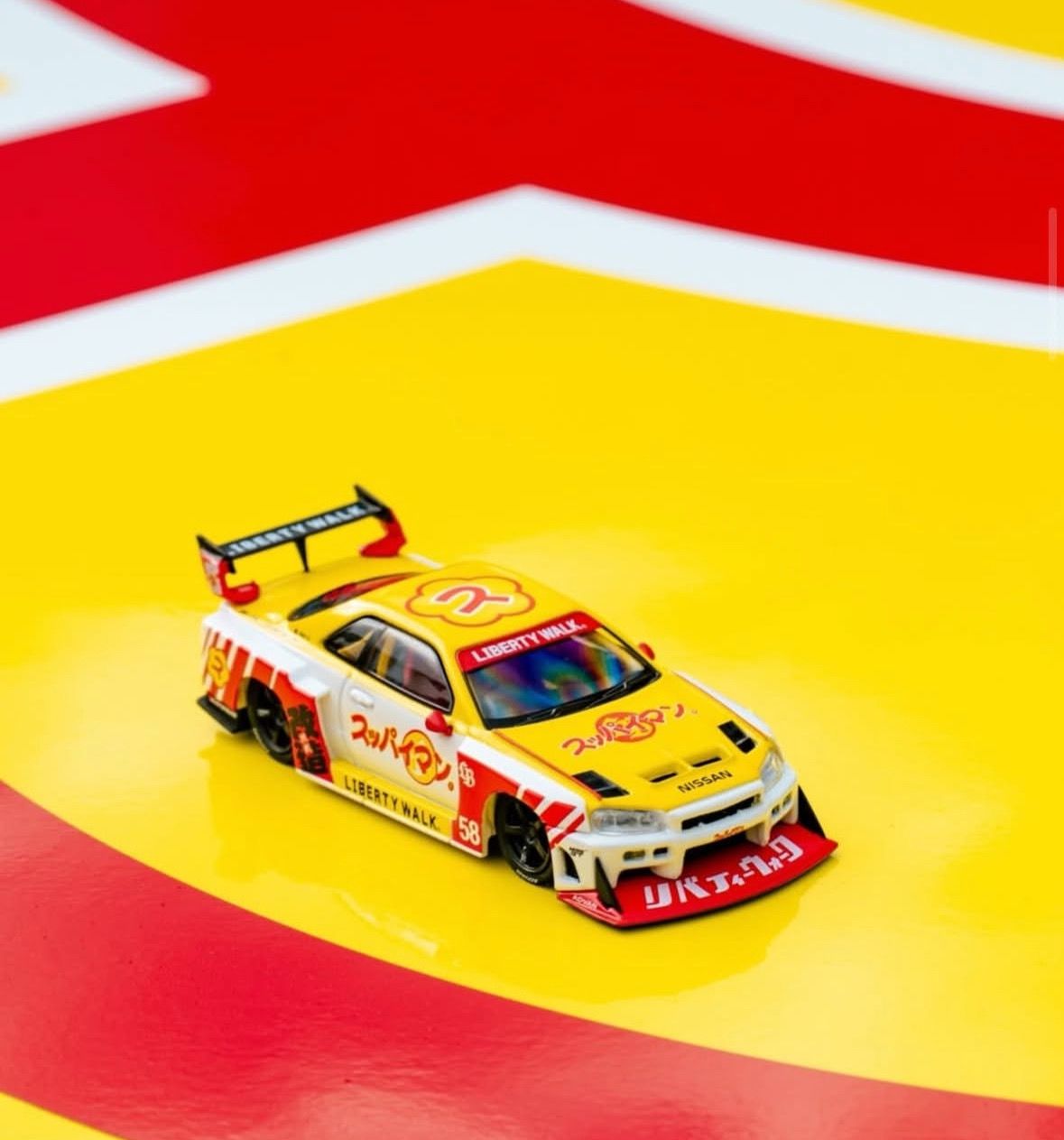 PREORDER] #1162 MINI GT x SUPAIMAN Nissan Skyline ER34 LBWK | 2026