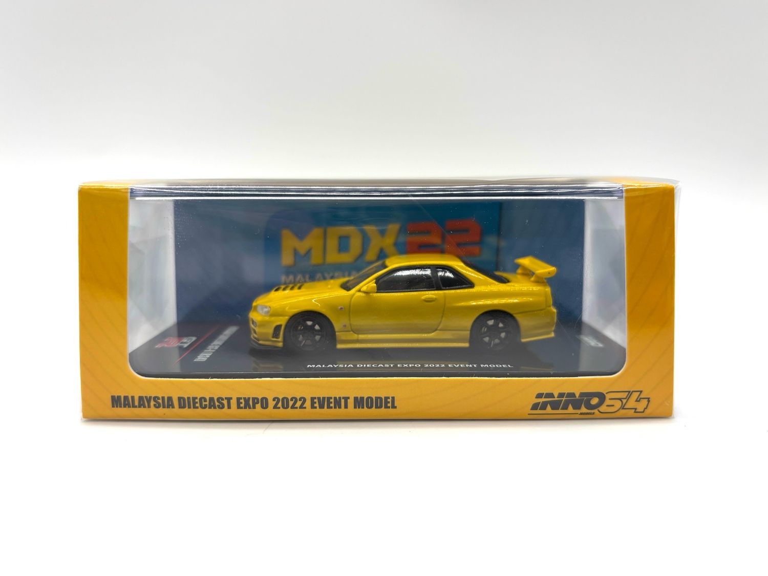 INNO64 Nissan Skyline GT-R (R34) Yellow | 2022 Malaysia Diecast Expo