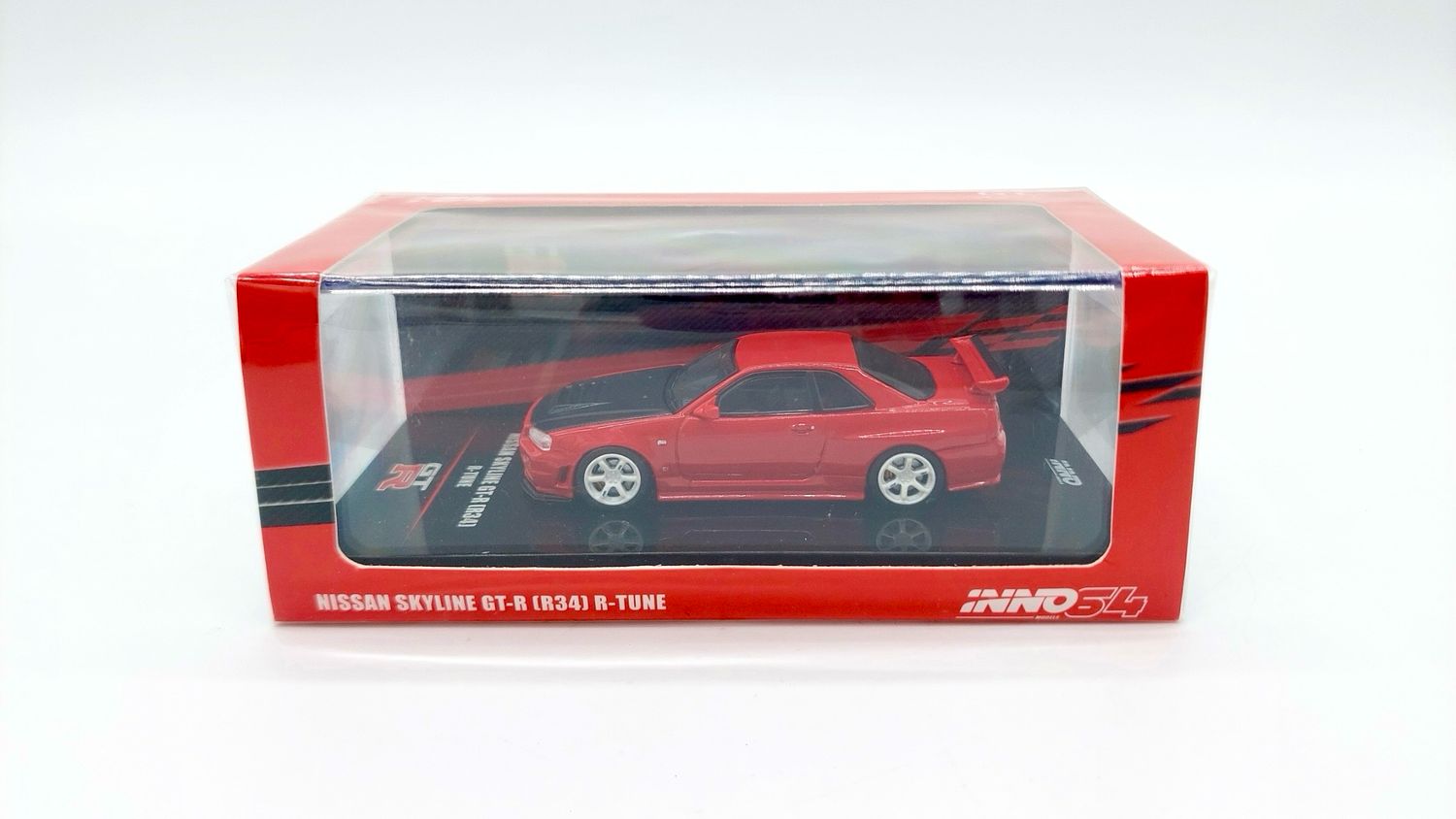 INNO64 Nissan Skyline GT-R (R34) R-Tune Active Red With Carbon Bonnet