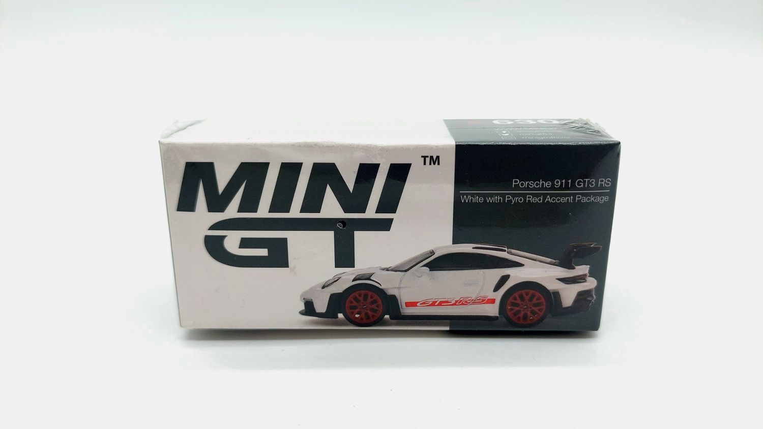 #630 MINI GT Porsche 911 (992) GT3 RS White  with Pyro Red Accent Package