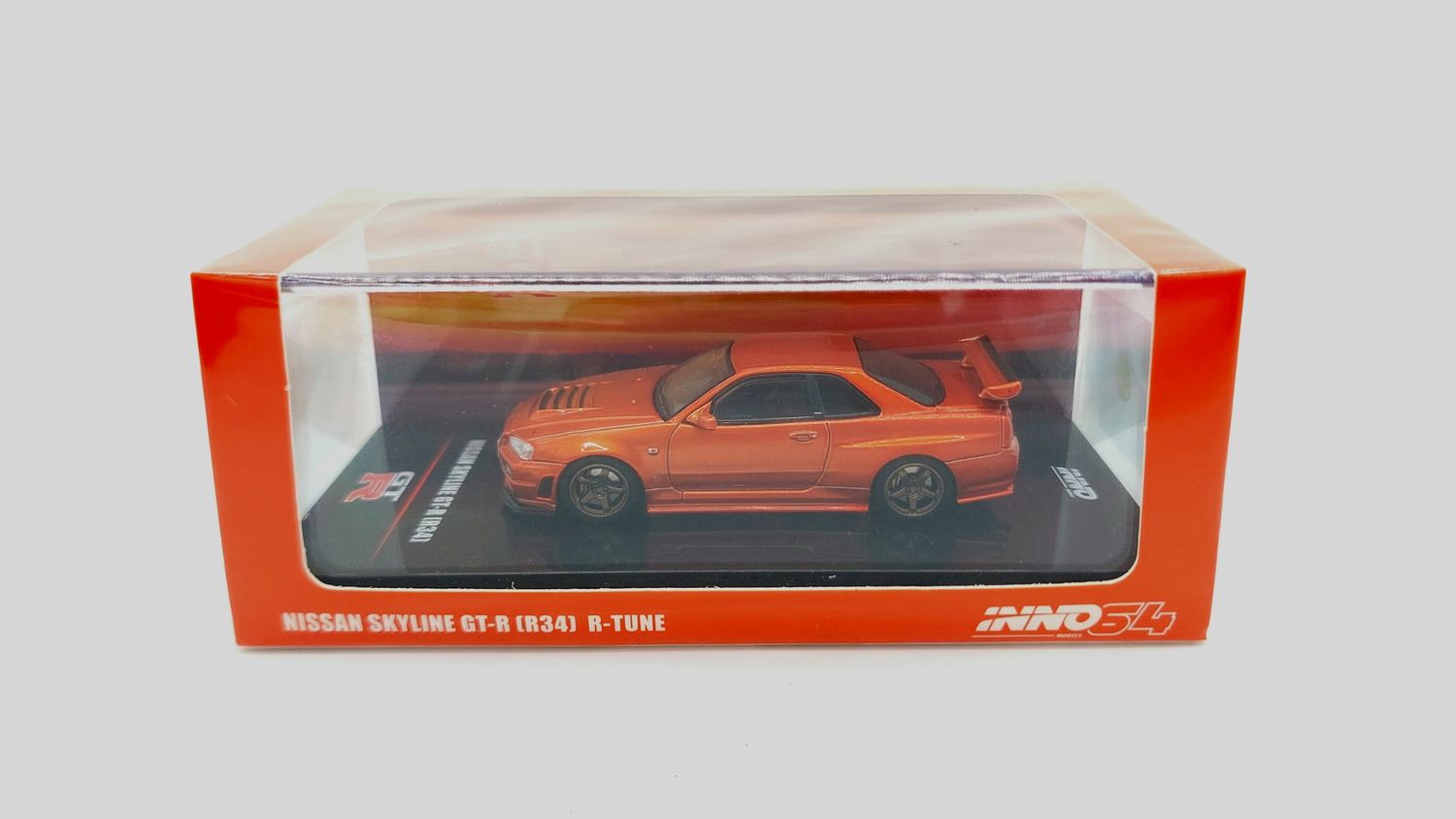 INNO64 Nissan Skyline GT-R (R34) R-Tune Orange Metallic