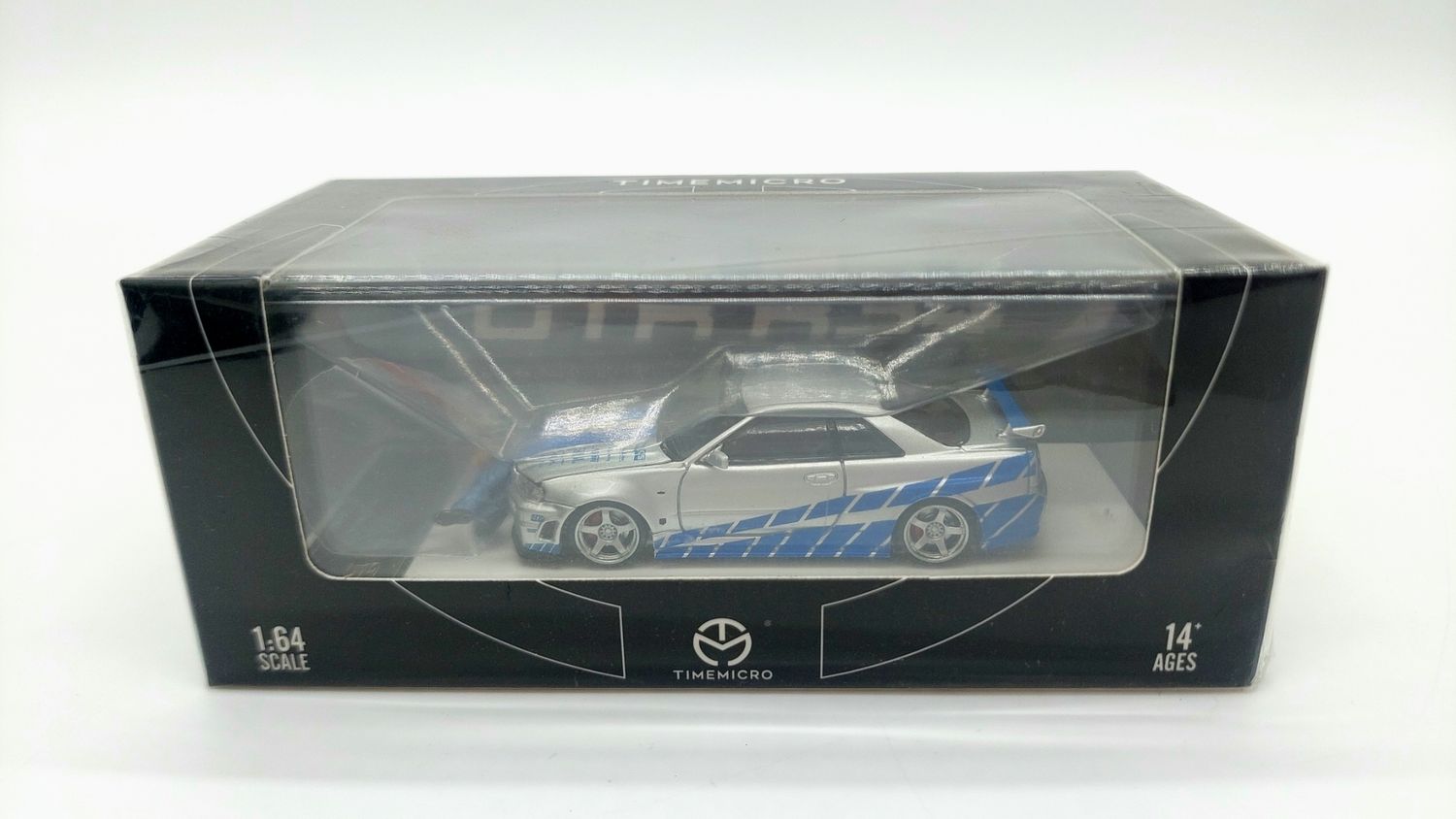 Time Micro Nissan Skyline GT-R (R34) Brian Livery with Figurine