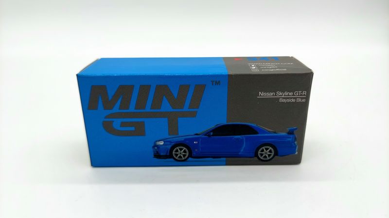 [UNSEALED] #341 MINI GT Nissan Skyline GT-R (R34) V-Spec II Bayside Blue
