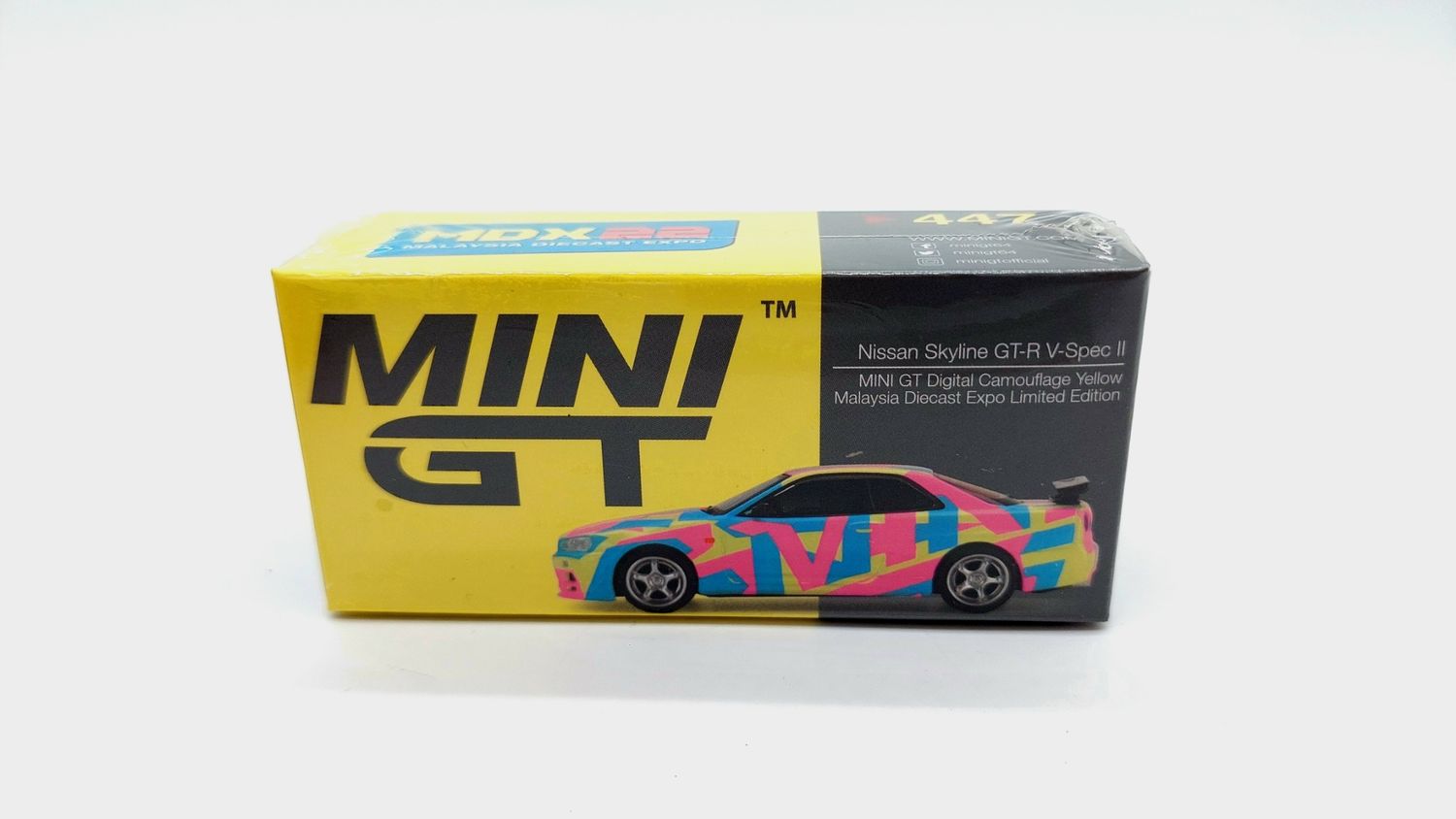 #447 MINI GT Nissan Skyline GT-R (R34)V-Spec ll MINI GT Digital Camouflage Yellow MDX 2022 Event Special Malaysia Diecast Expo