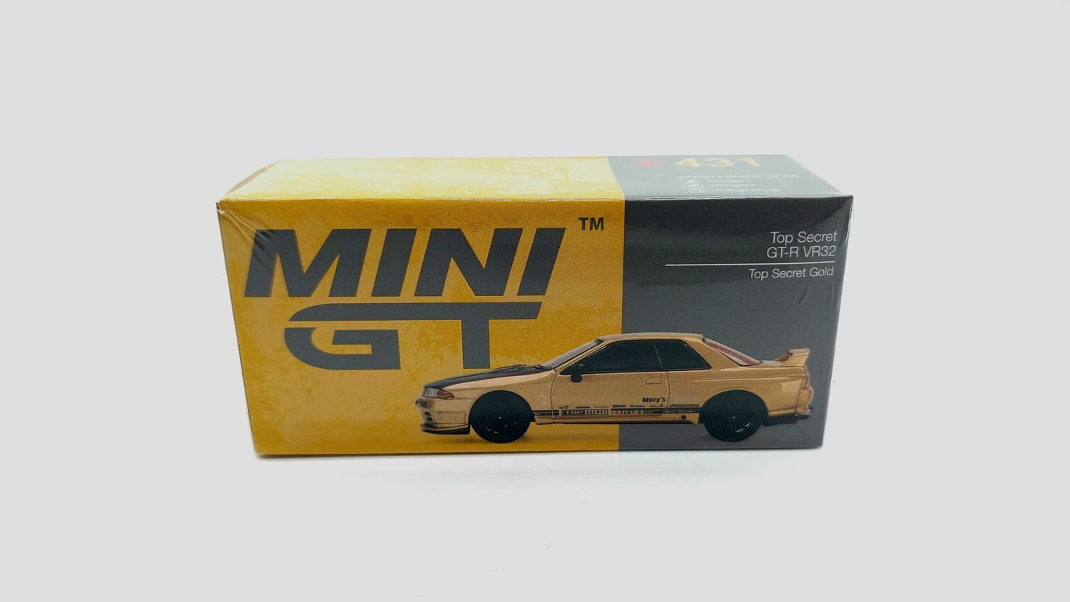 #431 MINI GT Top Secret Nissan Skyline GT-R VR32 Gold