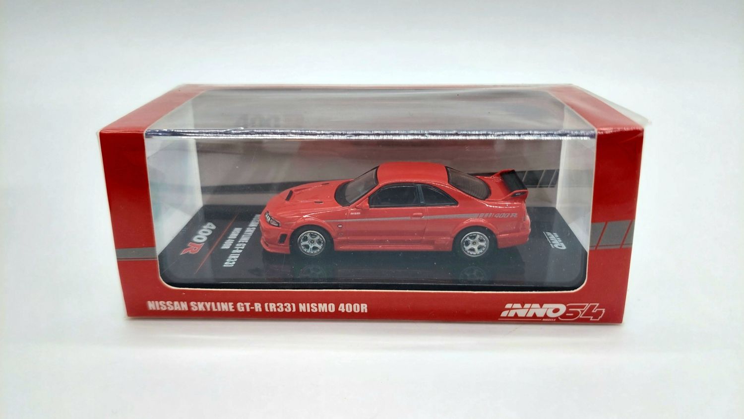 INNO64 Nissan Skyline GT-R (R33) Nismo 400R Super Clear Red II INNO64 Nissan Skyline GT-R (R33) Nismo 400R Super Clear Red II