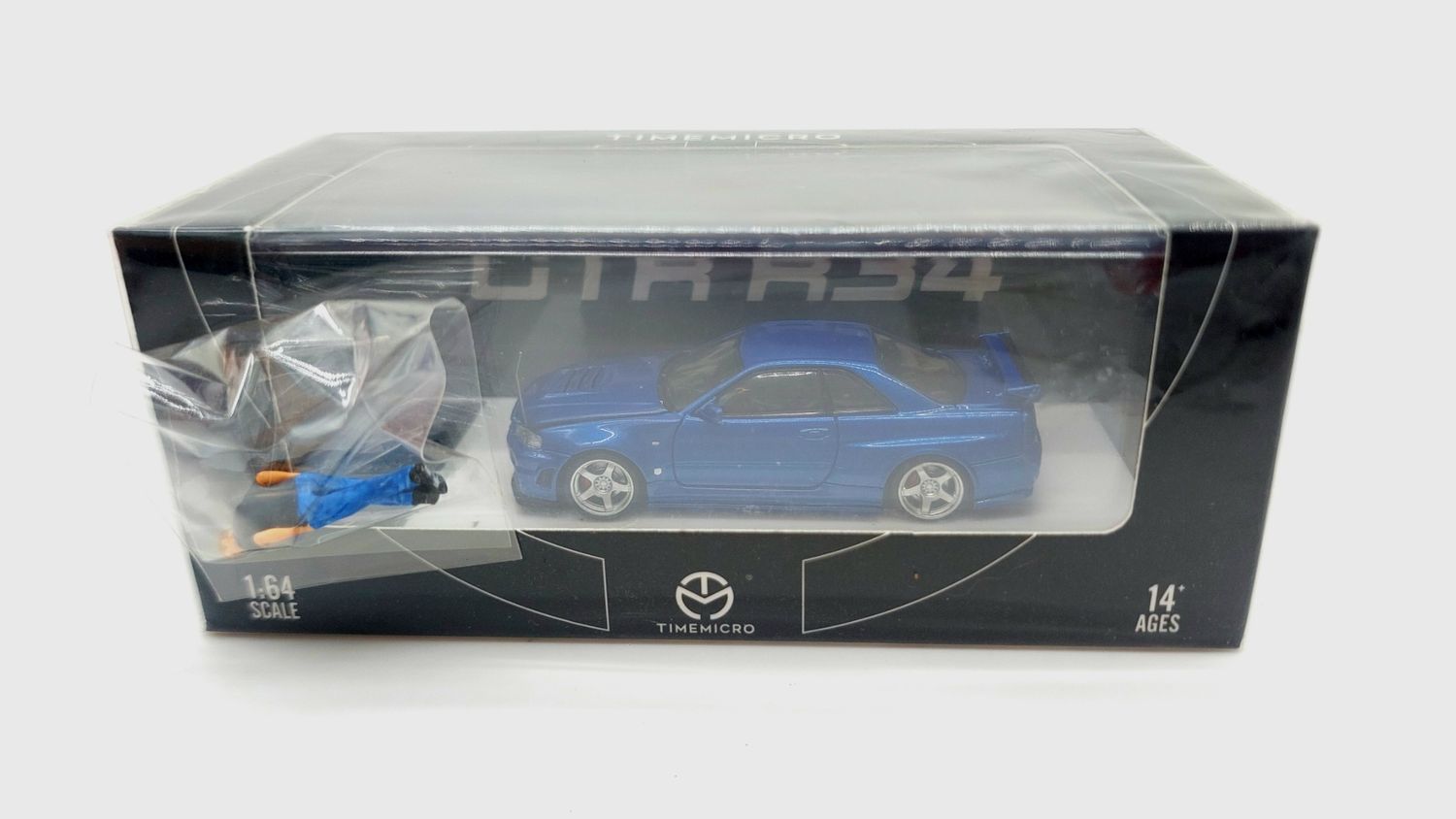 Time Micro Nissan Skyline GT-R (R34) Bayside Blue with Brian Figurine Time Micro Nissan Skyline GT-R (R34) Bayside Blue with Brian Figurine