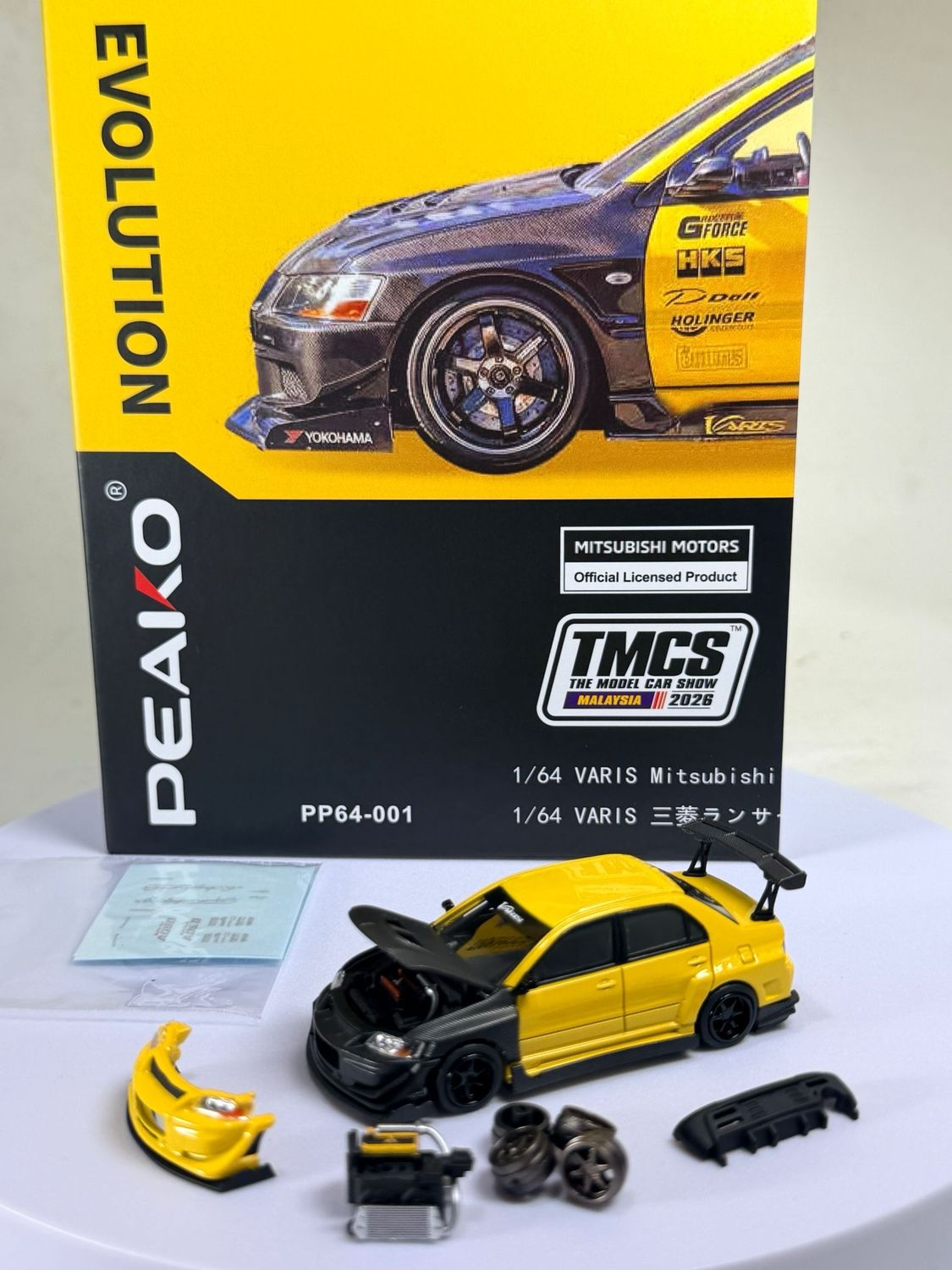 [PREORDER] PEAKO Varis Mitsubishi Evolution Yellow / Black | 2026 The Model Car Show