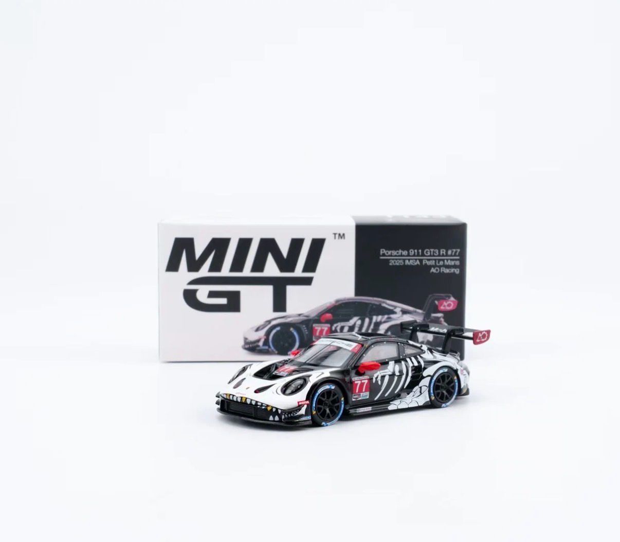 #1143 MINI GT Porsche 911 GT3 #77 AO Racing 2025 IMSA Petit Le Mans Skeleton Rexy | Regular Box
