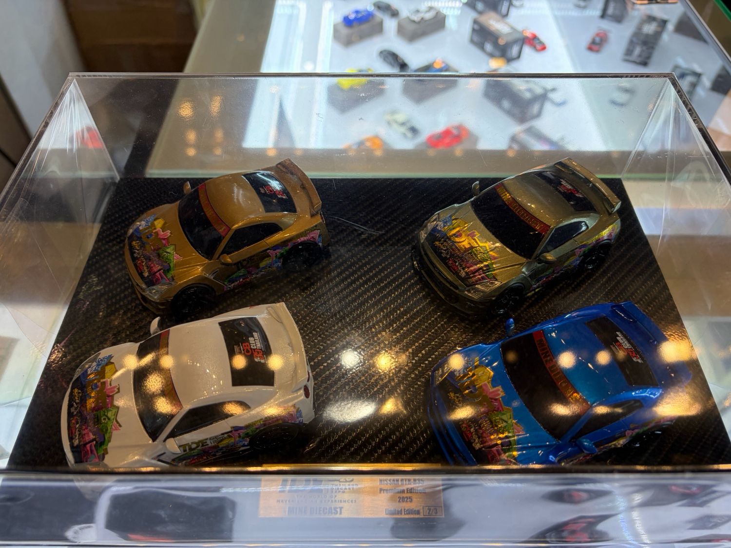 [PREORDER] Heng’s Garage x MINE DIECAST Nissan GTR-R35 Limited Edition Set of 4 Cars Acrylic Box Set | 2026 Thailand Diecast Expo